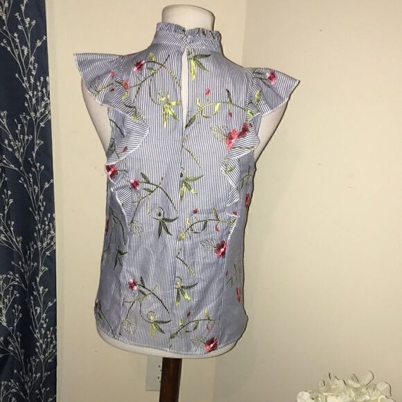 BCBGeneration Sleeveless Ruffle Embroidered Top - Picture 3 of 7